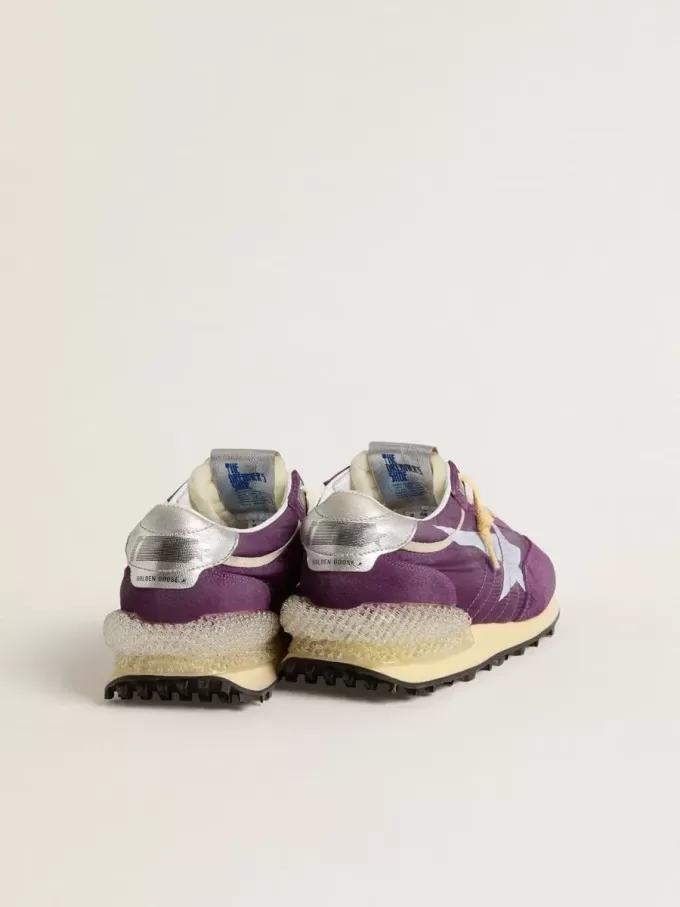Marathon för damer med lila nylonöverdel och vit stjärna