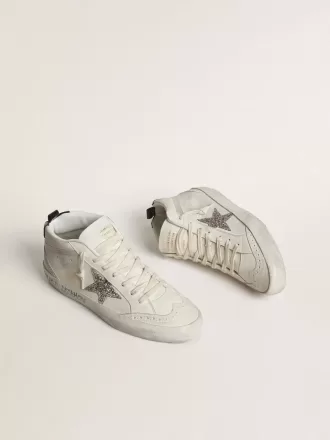 Mid Star för damer med silverglittrande stjärna och svart laminerad hälflik
