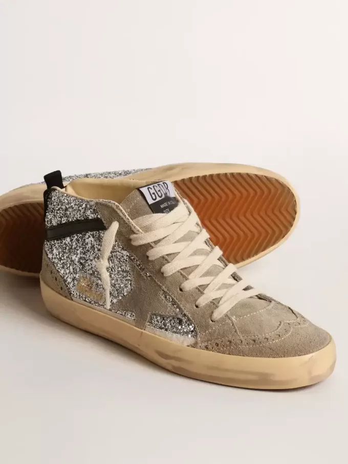 Mid Star i silverglitter med mocka-stjärna och svart flash Mid Star i silverglitter med mocka-stjärna och svart flash
