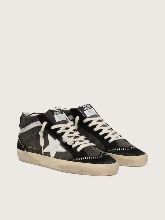 Mid Star LTD i svart denim med insatser i mocka och Swarovski-kristaller