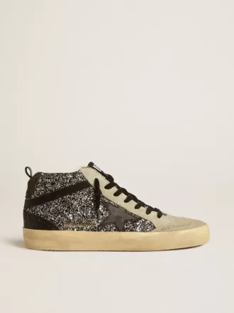 Mid Star LTD i svart glitter med svart läderstjärna och blixt