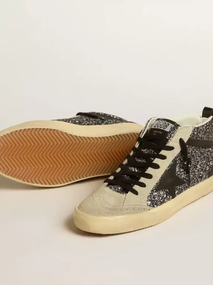 Mid Star LTD i svart glitter med svart läderstjärna och blixt