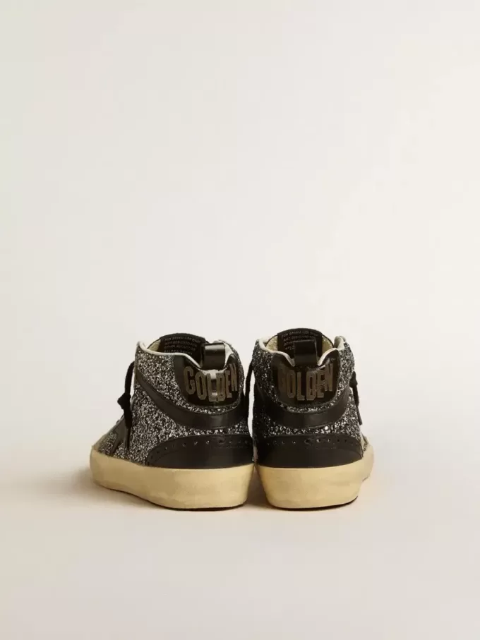 Mid Star LTD i svart glitter med svart läderstjärna och blixt