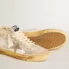 Mid Star LTD med pärlemorskimrande stjärna i mocka och beige krokad hälflik Mid Star LTD med pärlemorskimrande stjärna i mocka och beige krokad hälflik