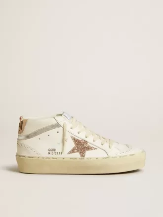Mid Star med glitterstjärna och metalliskt silverläder