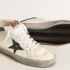 Mid Star med grön metallisk läderstjärna och vit blixt Mid Star med grön metallisk läderstjärna och vit blixt