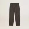 Militärgröna joggingbyxor för barn med broderi Militärgröna joggingbyxor för barn med broderi