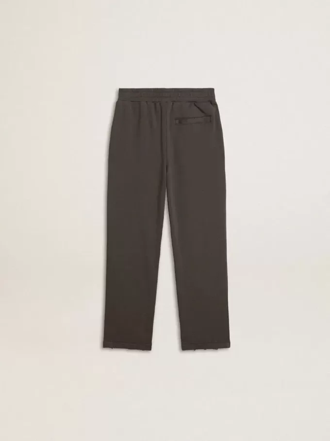 Militärgröna joggingbyxor för barn med broderi Militärgröna joggingbyxor för barn med broderi