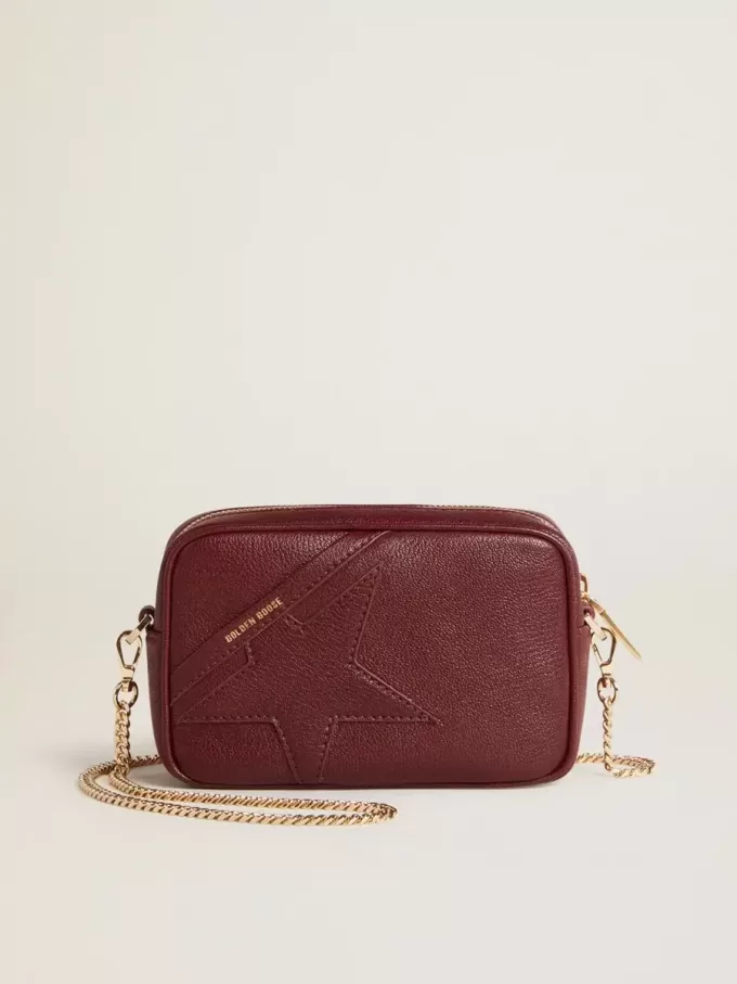 Mini Star Bag i vinrött läder med ton-i-ton-stjärna Mini Star Bag i vinrött läder med ton-i-ton-stjärna