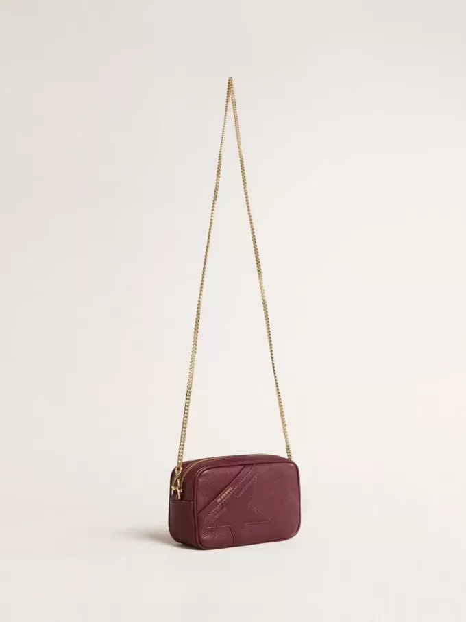Mini Star Bag i vinrött läder med ton-i-ton-stjärna Mini Star Bag i vinrött läder med ton-i-ton-stjärna