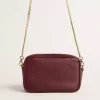 Mini Star Bag i vinrött läder med ton-i-ton-stjärna Mini Star Bag i vinrött läder med ton-i-ton-stjärna
