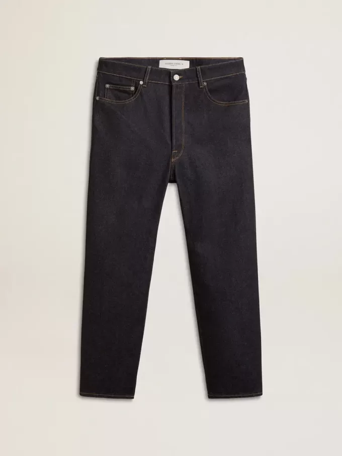 Mörkblå jeans för herr i en tvättad denim