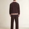 Mörkblå sweatshirt med dragkedja och vit logotyp för herr