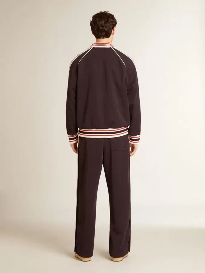 Mörkblå sweatshirt med dragkedja och vit logotyp för herr
