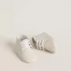New Born sneakers i vitt läder med perforerad stjärna
