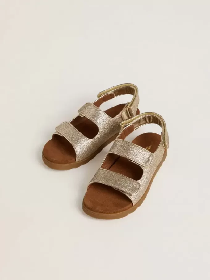 Noa Junior-sandaler i mikroglitter och platinaläder Noa Junior-sandaler i mikroglitter och platinaläder