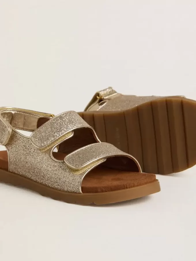 Noa Junior-sandaler i mikroglitter och platinaläder Noa Junior-sandaler i mikroglitter och platinaläder