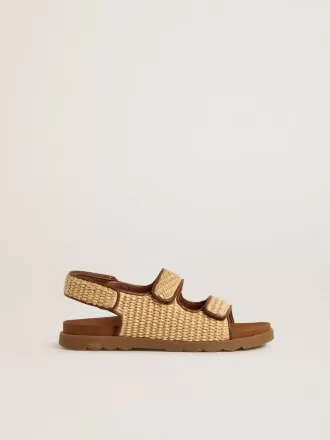 Noa-sandaler för barn i beige raffia och brunt läder Noa-sandaler för barn i beige raffia och brunt läder