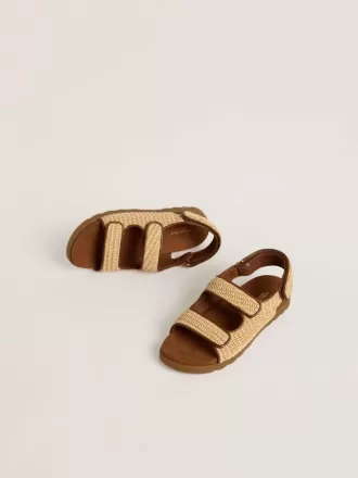 Noa-sandaler för barn i beige raffia och brunt läder Noa-sandaler för barn i beige raffia och brunt läder