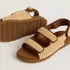 Noa-sandaler för barn i beige raffia och brunt läder Noa-sandaler för barn i beige raffia och brunt läder