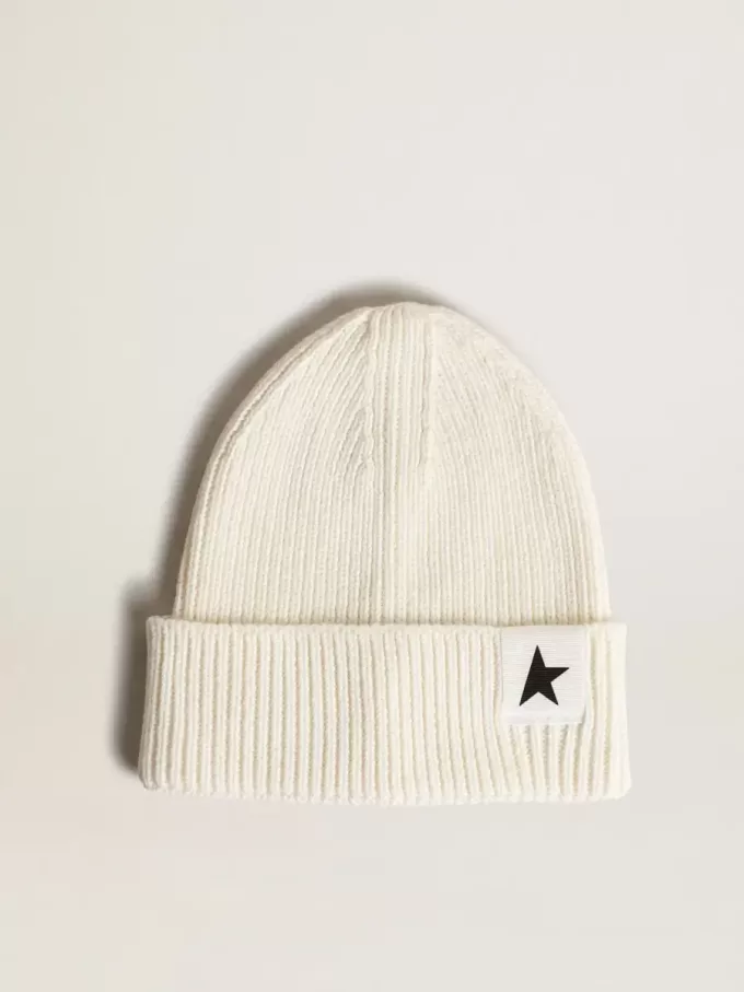 Off-white bomullsmössa med kontrasterande svart stjärna Off-white bomullsmössa med kontrasterande svart stjärna