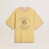 Oversized gul bomullst-shirt för herr med blå tryck