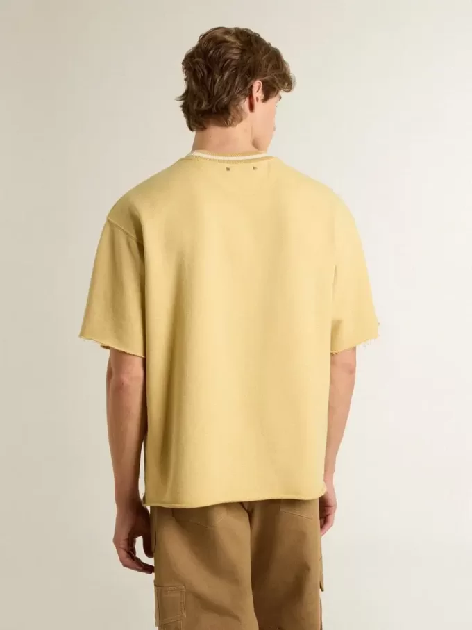 Oversized gul bomullst-shirt för herr med blå tryck