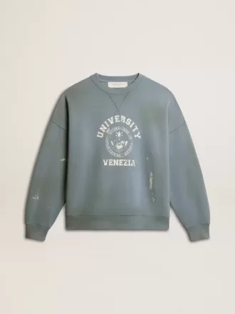 Oversized sweatshirt i babyblått med slitna detaljer