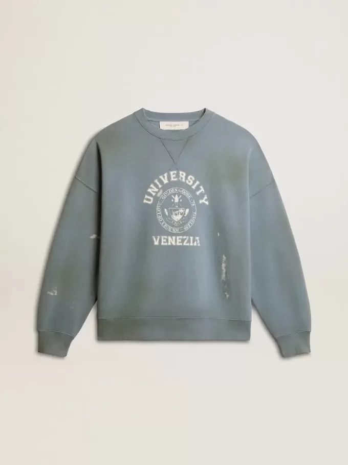 Oversized sweatshirt i babyblått med slitna detaljer