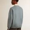 Oversized sweatshirt i babyblått med slitna detaljer