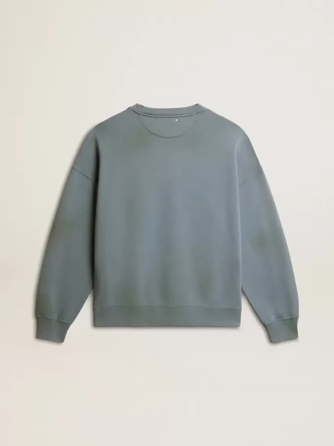 Oversized sweatshirt i babyblått med slitna detaljer