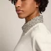 Papyrusvit Denise Star Collection-tröja med dragkedja och kristallkrage