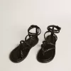 Penelope platta sandaler för damer i svart läder