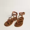 Penelope platta sandaler för damer i tobaksfärgat läder med mockasula