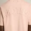 Puderrosa T-shirt med omvänd logotyp på baksidan – Jersey Capsule Puderrosa T-shirt med omvänd logotyp på baksidan – Jersey Capsule