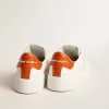 Purestar för damer med vit läderstjärna och orange hälflik