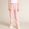 Rosa joggingbyxor med glitterstjärna på framsidan