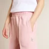 Rosa joggingbyxor med glitterstjärna på framsidan