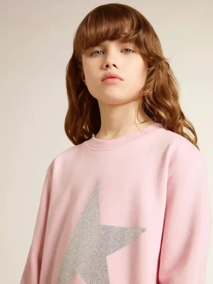 Rosa sweatshirt med maxistjärna i silverglitter på framsidan