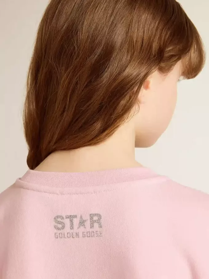 Rosa sweatshirt med maxistjärna i silverglitter på framsidan