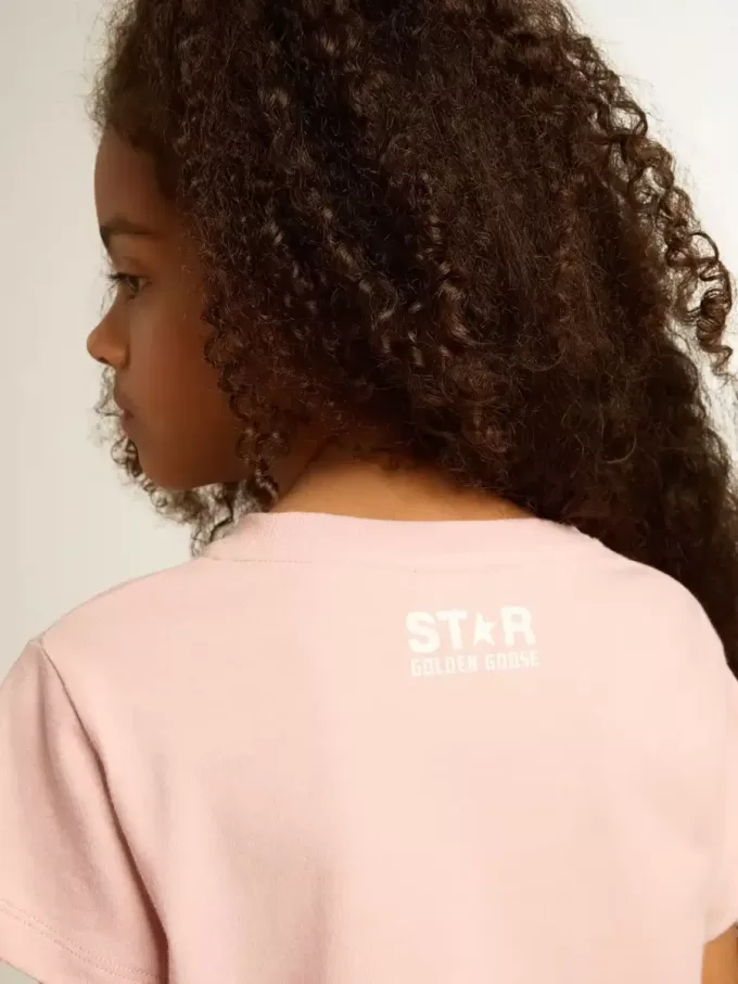 Rosa T-shirt för flickor med vit logotyp och stor stjärna