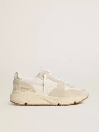 Running Sole för damer i canvas med beige stjärna och platinafärgad metallisk läderflik på hälen