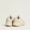 Running Sole för damer i canvas med beige stjärna och platinafärgad metallisk läderflik på hälen Running Sole för damer i canvas med beige stjärna och platinafärgad metallisk läderflik på hälen