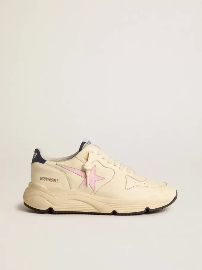 Running Sole för damer i nappaläder med rosa läderstjärna och blå läderflik på hälen Running Sole för damer i nappaläder med rosa läderstjärna och blå läderflik på hälen