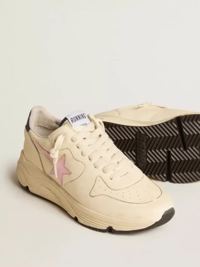 Running Sole för damer i nappaläder med rosa läderstjärna och blå läderflik på hälen Running Sole för damer i nappaläder med rosa läderstjärna och blå läderflik på hälen