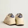 Running Sole för damer i nappaläder med rosa läderstjärna och blå läderflik på hälen Running Sole för damer i nappaläder med rosa läderstjärna och blå läderflik på hälen