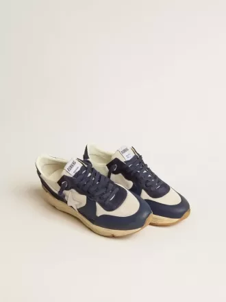 Running Sole i krämfärgat mesh och blått läder med en vit läderstjärna