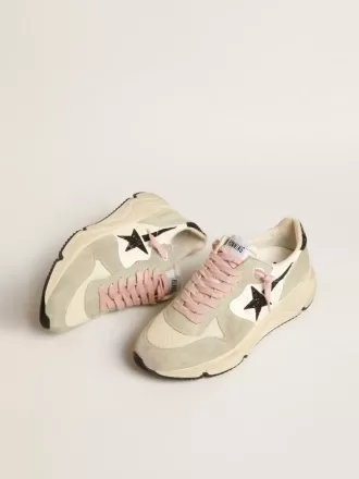 Running Sole med grå mockainsatser och svart glitterstjärna