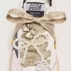 Skin ”Sparkling” beige broderade snören med applikationer av pärlor och guldberlocker