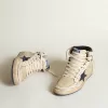 Sky-Star för herr i krämfärgat nylon och läder med blå mockastjärna Sky-Star för herr i krämfärgat nylon och läder med blå mockastjärna